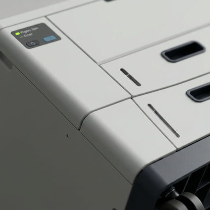 Extreme close-up of Xerox feeder panel, focusing on precise seams, status LED, and material texture.
