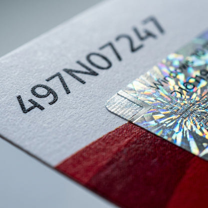 ~ Extreme macro view of Xerox software kit (MPN 497N07247) focus on printed ID and holographic security seal texture.