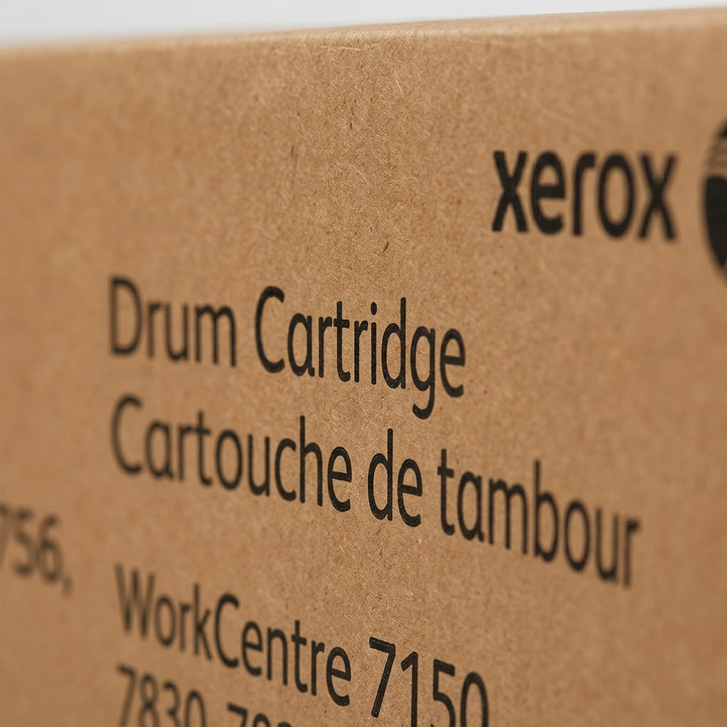 Extreme close-up of the Xerox drum cartridge box showing textured cardboard and precise label details.