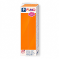 A high-resolution product shot of STAEDTLER Fimo Soft 454g (1lb) Tangerine modeling clay block.