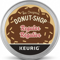A pure, high-resolution hero shot of a single K-Cup coffee pod, showcasing its top foil, brown chocolate-frosted graphic with white sprinkles, key text, and black Keurig bar.