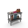 (CUSMA form attached) Rakabot Plastico 2 tier affordable water and mud collecting shoe and boot rack that stores 4 pairs. Stackable to 6 tier. Sturdy plastic easy to clean. Light grey color. Made In Canada Invention.