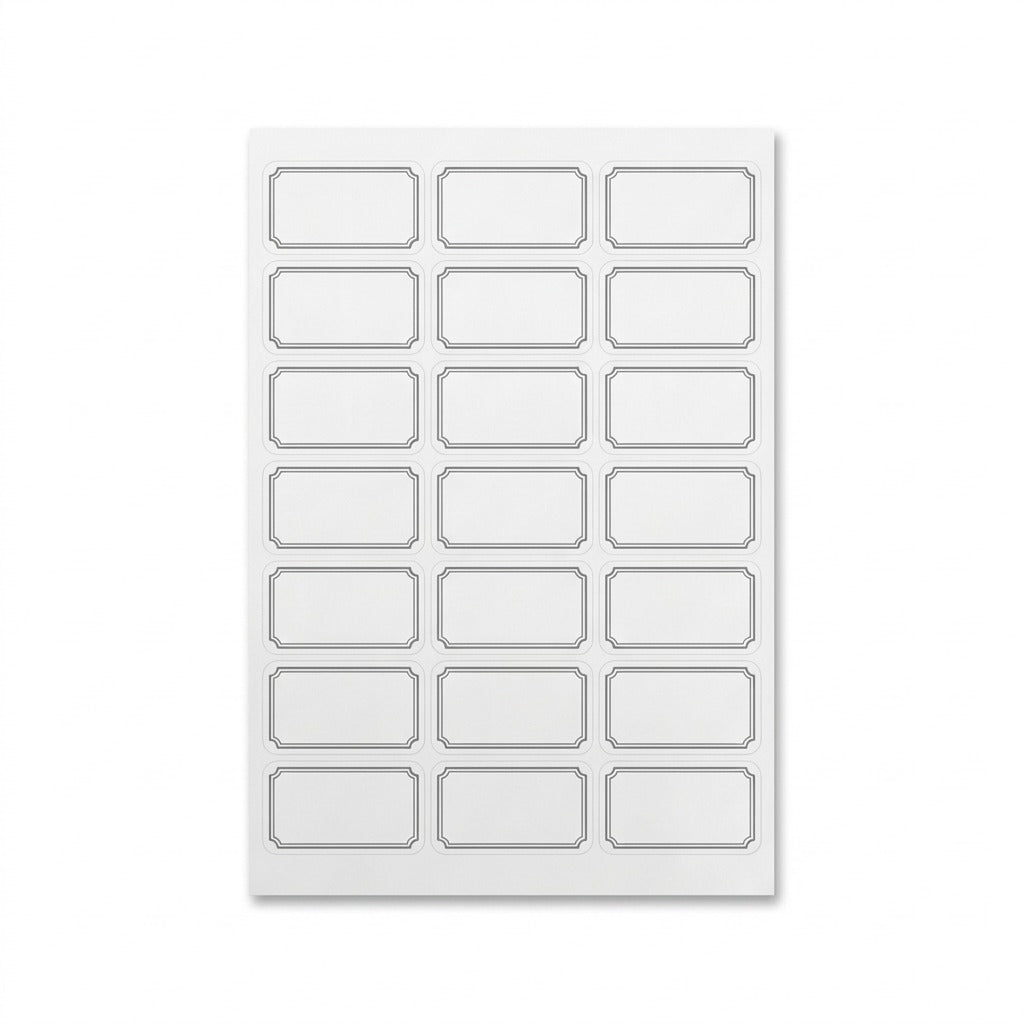 Pure high-resolution hero shot of a sheet of twenty-one white Avery No-Iron Fabric Labels with distinct grey decorative borders.
