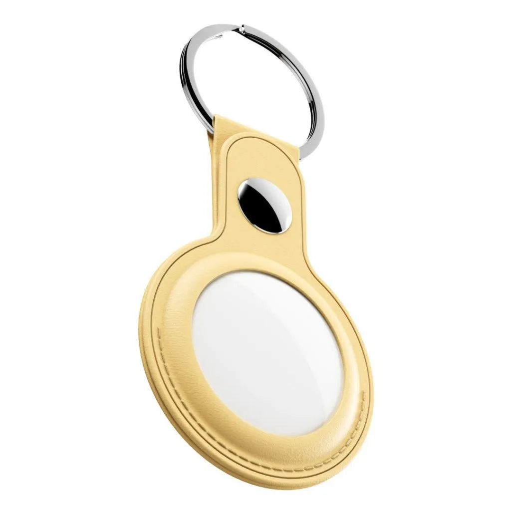 Shop KeyBudz AT2_S1_PYL pastel yellow AirTag keyrings. 2-pack with genuine leather holders, metal rings and secure snap closures for Apple AirTag.