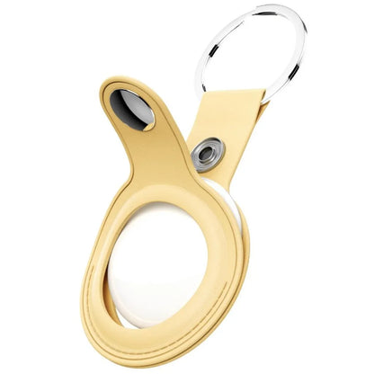 Shop KeyBudz AT2_S1_PYL pastel yellow AirTag keyrings. 2-pack with genuine leather holders, metal rings and secure snap closures for Apple AirTag.
