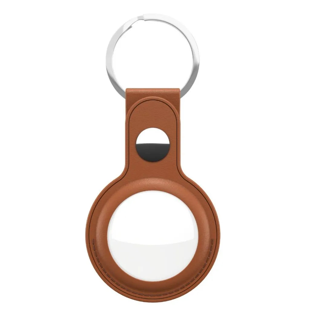 A brown leather magnifying glass keychain with a silver metal split ring, shown on a solid white background.