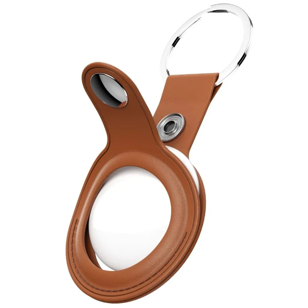 Brown leather keychain with a metal clip on a white background